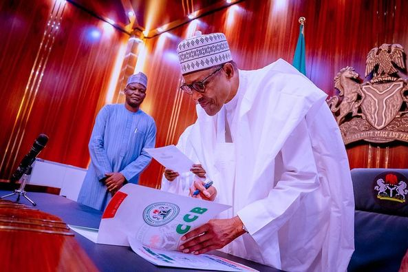 In Pictures : CCB Chairman Presents Asset Declaration Form  To President Buhari In Abuja