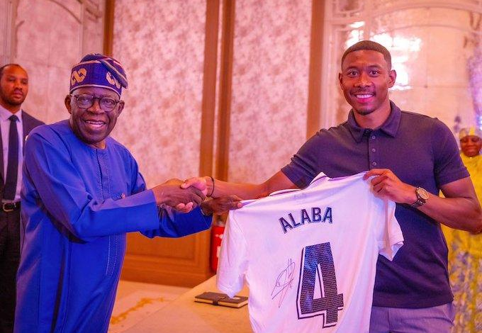 In Picture: David Alaba Gifts President Tinubu His Real Madrid Jersey In Paris