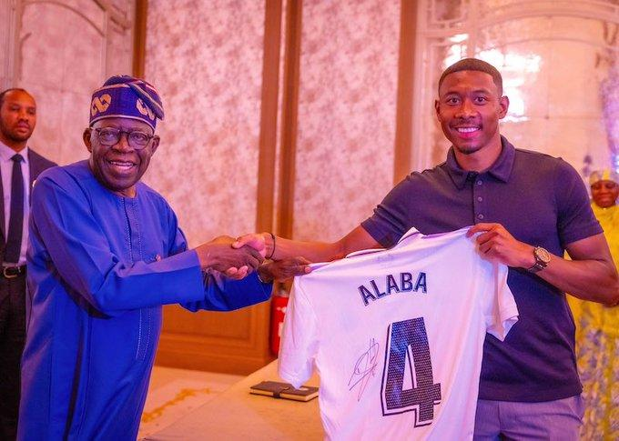 In Picture: David Alaba Gifts President Tinubu His Real Madrid Jersey In Paris